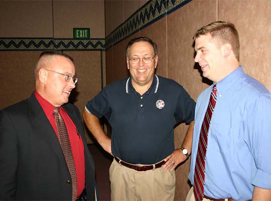 Who can guess what Warren Emmer (ND) said here? You know it had to be funny based on Chuck Placek (ND) and Sam Razor (National Office) faces. (2004)