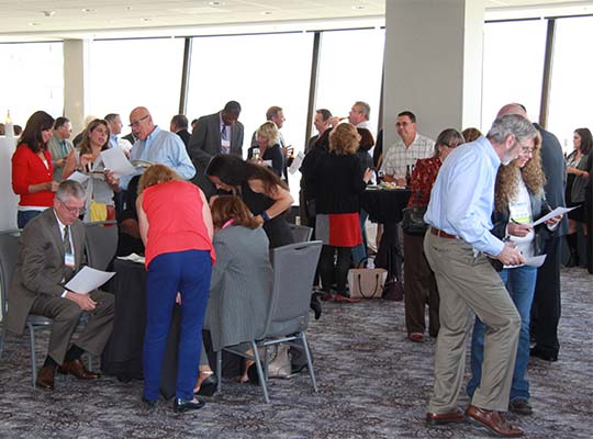 Commission members play an ice-breaker game during the reception at the 2015 Annual Business Meeting in Portland, OR.