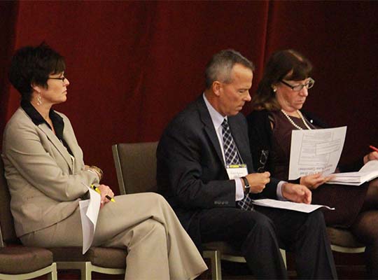 Anne Precythe (NC), Gary Roberge (CT), and Jane Siegal (IN) prepare to give committee updates to the Commission at the 2017 Annual Business meeting in Pittsburgh, PA.
