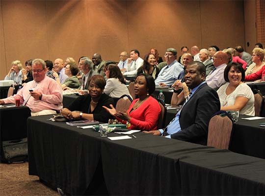 Commission members compete in a jeopardy game at the 2014 Annual Business Meeting in Oklahoma City, OK.